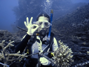 Coral restoration diver planting corals